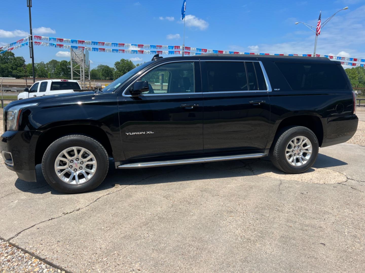 2016 Black /Black GMC Yukon XL SLT (1GKS1GKC9GR) with an 5.3L V8 engine, Automatic transmission, located at 4520 Airline Hwy, Baton Rouge, LA, 70805, (225) 357-1497, 30.509325, -91.145432 - 2016 GMC Yukon XL SLT 5.3 V8 Gas, 173K Miles, Heated & Cooled Leather Seats, 8 Passenger Seating, Sunroof, Dual DVD, Backup Camera, Power Windows, Locks & Mirrors, Cold A/C, Tow Pkg. FOR INFO PLEASE CONTACT JEFF AT 225 357-1497 CHECK OUT OUR A+ RATING WITH THE BETTER BUSINESS BUREAU WE HAVE BEEN A - Photo#1